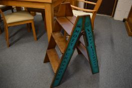 A pair of folding Champagne steps.