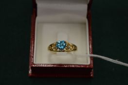A 14ct gold and gem set ring.