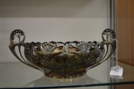 An Art Nouveau style plated twin handled bowl.