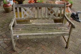 A hardwood garden bench.