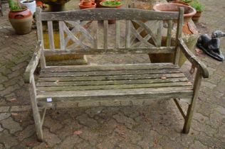 A hardwood garden bench.