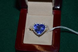 An 18ct gold and gem set ring.