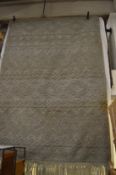 A Berber inspired grey woollen carpet, 220cm x 160cm.
