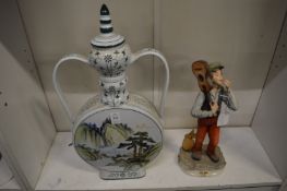 A large Chinese style moon flask and a Capodimonte figure.