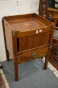 A 19th century mahogany pot cupboard.