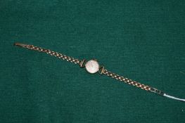 A ladies 9ct gold wristwatch.