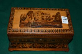 Tunbridge ware, a good two division tea caddy, the hinged cover inset with ruins.