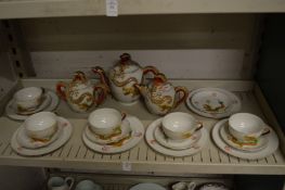 A Japanese eggshell porcelain part tea service.