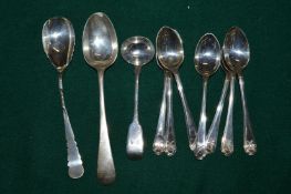 A small group of silver spoons.