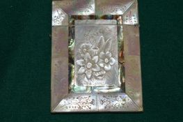 A Victorian mother of pearl and abalone calling card case.