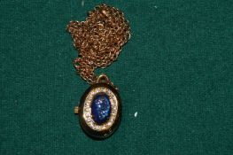 A ladies pendant watch.