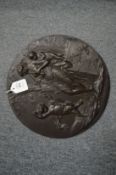 A good patinated cast bronze circular plaque depicting classical figures.