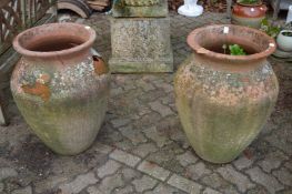 Large pair of terracotta urns (faults).