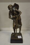 Bronze figure of an Arab water vendor.
