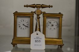 A brass combination miniature carriage clock and barometer.