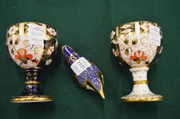 A Crown Derby wren and two Crown Derby goblets.