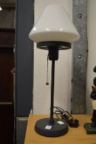 A stylish table lamp.