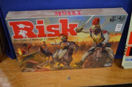 A boxed and unopened game of Risk.
