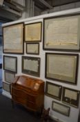 A large quantity of framed indentures.