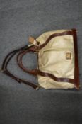 A Burberry leather and cloth large handbag or holdall.