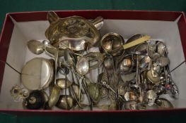 A small group of plated spoons and other items.