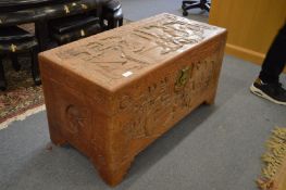 A Chinese carved camphor wood coffer.