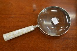 A large magnifying glass.