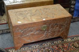 A small Chinese carved camphor wood coffer.