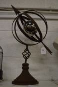A metal armillary sphere.