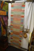 A Kilim runner, 295cm x 80cm.