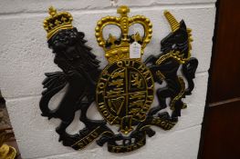 A cast metal coat of arms.
