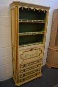 Continental style decoratively painted secretaire cabinet with four drawers.