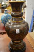 A large pair of cloisonne vases on stands.