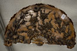 Decorative Chinese resin model of a fan shaped sculpture.
