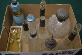 Cut glass scent bottles, several with silver mounts.