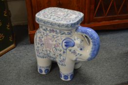 A pair of pottery elephant seats.