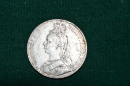 A Victorian silver five pound piece.