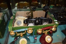 Various old telephones.