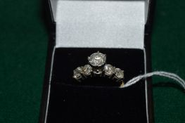 A 14ct gold and gem set ring.