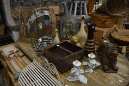 Quantity of decorative items to include candle stands, carved wood lion, terrarium etc.