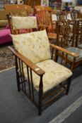 1930's oak framed armchair with adjustable back.