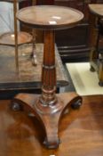 A 19th century mahogany jardiniere stand.