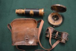 Telescope, binoculars and a compass.