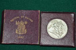 A 1951 crown, boxed.