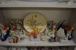 Quantity of decorative porcelain figures and other items.