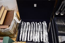 A cased set of twelve steak knives.