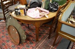 An oak extending dining table.