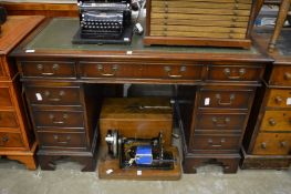 Reproduction mahogany pedestal desk.
