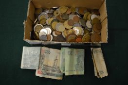 Various coins and bank notes.