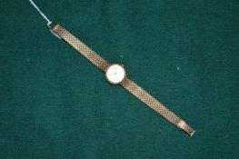 A ladies 9ct gold wristwatch.